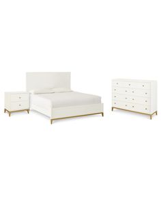 a white bed with two nightstands and a night stand