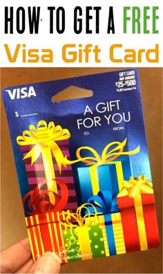 a person holding up a visa gift card with the words how to get a free visa gift card