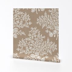 a brown and white wallpaper with leaves on it's side, against a white background