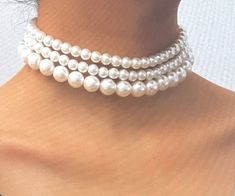 "3 PC Pearl Choker Necklace , Elegant Imitation Pearl Chokers , Beaded Necklace , White Pearls 3 Elegant Single Strand Faux Pearl Necklace is very classy ! The larger pearl necklace is 14 \" + 3 \" extension The 2 smaller pearl necklace are 15 1/2 \" + 3 \" extension YOU CAN CHOOSE TO WEAR THEM AT THE SAME TIME AND LAYER THEM OR WEAR 1 NECKLACE  Please ask question as I do not accept returns but contact me if there is a problem ! Thank You!" Elegant White Beaded Necklace, Beaded Necklace White, Small Pearl Necklace, Large Pearl Necklace, Necklace Elegant, Pearl Choker Necklace, Necklace White, Wedding Jewellery Necklace, Faux Pearl Necklace