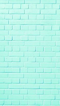 a light blue brick wall with no mortar