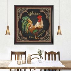 a rooster is sitting on the table in front of a sign that says welcome to the country