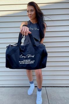 Always carrying a bunch of stuff at the gym, well now you can throw it all in this motiational bag and carry it around. Practical Black Duffle Bag For Gym, Large Capacity Gym Bag, Athleisure Gym Bag With Large Capacity, Sporty Black Duffle Bag For Streetwear, Large Capacity Athleisure Gym Bag, Large Capacity Gym Bag In Athleisure Style, Black Athleisure Gym Bag, Sporty Gym Bag With Large Capacity For Workout, Black Sporty Gym Bag For Workout