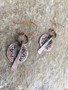 "These unique earrings are hand forged from pure organic copper. The metal has been oxidized for an aged, rustic look. Choose from copper ear wires as shown or from Sterling silver option at checkout. These earrings are versatile & perfect for everyday wear. Copper is the traditional gift for the 7th Anniversary. MEASUREMENTS & SPECIFICS: LENGTH: 2.5\" from earlobe WIDTH: 1\" diameter METAL: pure organic copper EAR WIRE: choose from Sterling silver or copper at checkout READY TO SHIP! Al Hand Forged Copper Earrings For Festivals, Nature-inspired Hand Forged Copper Jewelry, Bohemian Hand Forged Copper Wire Earrings, Unique Silver-colored Copper Earrings, Unique Copper Earrings With Patina, 7th Anniversary Gifts, 7th Anniversary, Metalwork Jewelry, Anniversary Gift For Her