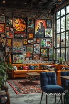 a living room filled with furniture and lots of posters on the wall above it's windows