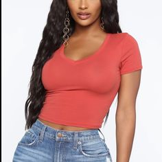 Fashion Nova V Neck Crop Tee - Rust Short Sleeve Tee V Neck Cropped Stretch 95% Cotton 5% Spandex The Color Is A True Rust Color. Its A Little More Orange Than The Picture Shows. Basic Fitted V-neck Top, Casual V-neck Fitted Top, Red Seamless V-neck Top, Red Seamless Crop Top, Seamless Red Crop Top, Trendy Red Seamless Tops, Trendy Seamless V-neck Top, Casual Seamless Short Sleeve Top, White Ribbed Top