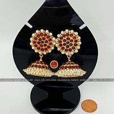 Design by Classical Dance Jewelry® ❥ Colorful and Designer traditional big pearl top and normal butta or jhumka Kemp temple Indian Jewelry Earrings in Red, Green stones combo ❥ Model no: EA-04 ❥ Age : 5 yrs and up ❥ You Can wear this set especially for Bharatnatyam And Kuchipudi Dance Performances and in Parties, Engagement, Weddings, Birthdays. ❥ Handmade Indian Item. Set includes ☛ Earrings pair PLEASE NOTE ❥ ALL SALES ARE FINAL ✅ ❥ No Return/ No Exchange / No Cancellation! ❥ It's handmade ite Round Temple Jewelry Jhumkas For Ceremonial Occasions, Navratri Ceremonial Round Jhumkas, Ceremonial Round Jhumkas For Navratri, Round Jhumkas For Navratri Ceremonial, Ceremonial Jhumkas For Navratri, Ceremonial Temple Jewelry Bridal Earrings With Tilla, Diwali Celebration Temple Bridal Earrings, Heavy Temple Jewelry Tikka For Celebration, Temple Jewelry Jhumkas For Festivals And Celebrations