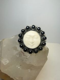 "Large face ring size 8.25 onyx ? sterling silver women girls  Size 8.25 Between a size 8.25 and a size 8.50  Weight 23.7g  Length 1 1/2\" Width.  1 1/2\" Thinnest part   3/16\" Free Shipping & Free Postal Insurance   Delivered in a Gift Box  Free First Class shipping and postal insurance is included. If you want to upgrade to priority kindly pay an additional fee to do so.  This is recommended if you would like to have your package delivered faster than first class which has slowed down due o a variety of factors" Black Sterling Silver Symbolic Jewelry, Adjustable Silver Onyx Ring, Black Symbolic Sterling Silver Jewelry, Symbolic Black Round Jewelry, Symbolic Black Oval Jewelry, Collectible Onyx Ring Jewelry, Black Spiritual Collectible Jewelry, Hallmarked Round Onyx Jewelry, Hallmarked Onyx Round Jewelry