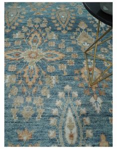 a blue rug with an ornate design on it