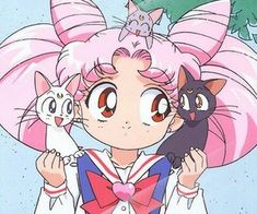 an anime character with pink hair holding a cat and wearing a sailor outfit while standing in front of a tree