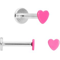 16 Gauge 5/16 Blue Pink Yellow Glow Heart Labret Set of 3 If you're looking for body jewelry that will draw attention to your piercings in the most amazing way then you will love this set of 16 gauge labret jewelry that glows in the dark! Made with 8mm durable 316L surgical grade stainless steel straight barbells, these monroe piercings feature one blue heart end, one yellow heart end, and one pink heart end end that glow in the dark and will look great in piercings like your lip, monroe, and la Cute Lip Rings, Snakebite Piercing Jewelry, Lip Jewelry Piercing, Body Candy Jewelry, Back Dimple Piercings, Glow Heart, Philtrum Piercing, Lip Piercing Jewelry, Septum Piercing Jewelry