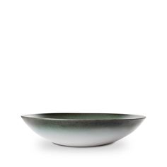 a black and white bowl sitting on top of a table