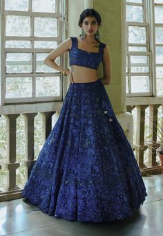 Editor's Note Navy Blue Organza Lehenga With Floral Embroidery Teamed With Square Neck Blouse With Scallop Detail And Cutwork Organza Dupatta Color: Navy Blue Fabric: Organza, Chanderi Care: Dr... Blue Organza Lehenga, Dark Blue Lehenga, Lehenga Purple, Lehenga Simple, Navy Blue Lehenga, Embroidery Square, Scalloped Blouse, Square Neck Blouse, Organza Embroidery