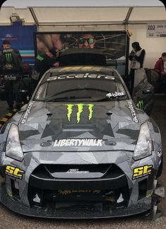 the front of a car with monster logo on it