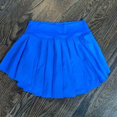 Super Cute Blue Aerie Skirt! Perfect Condition, Basically Brand New! Blue Stretch Swim Skirt Casual Style, Blue Stretch Casual Swim Skirt, Casual Blue Stretch Swim Skirt, Blue Stretch Pleated Skort, Blue Flowy Swim Skirt For Spring, Blue Stretch Pleated Tennis Skirt, Stretch Blue Pleated Tennis Skirt, Casual Blue Pleated Tennis Skirt, Blue Stretch Swim Skirt For Spring