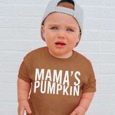 Mama's Pumpkin , Pumpkin Patch Shirt , Pumpkin Head , Pumpkin Shirt , Toddler Shirt , Baby Shirt , Fall Shirts , Fall Toddler Shirts G A R M E N T ∙ F E A T U R E S : * Uniquely soft fabric * Modern, unisex fit * Crew neck and short sleeves - Has a great comfortable fit you are sure to love F I T ∙ & ∙ S I Z I N G * Please consult size chart in pics for accurate fit. Please keep in mind that there are always slight variations in sizing. - Remember unisex tee's fit on the bigger side. F A B R I C Brown Long Sleeve Tops For Playtime, Cute Brown Tops For Playtime, Cotton Tops With Letter Print For Playtime, Cute Family Shirt With Letter Print, Brown Cotton Tops With Letter Print, Family Matching Cotton Shirt For Playtime, Cute Fall T-shirt For Playtime, Cute Family Shirt With Name Print, Fall Playtime Tops With Short Sleeves