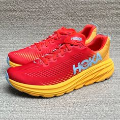 Hoka One One Men's Running Shoes Model: Rincon 3 Color: Fiesta Amber / Yellow Style: 1119395 / Fayw Brand New Shoes Without Box Delivering The Best Cushion-To-Weight Ratio On The Market, The Rincon 3 Returns In A Stupefyingly Light Silhouette. This Redesign Features An Asymmetrical Tongue, Thinner Pull Tab And A Vented-Mesh Upper For Ultimate Breathability. Our Extra-Light Midsole Foam Sports Aggressive Cutouts And Enhanced Rubber Coverage For Improved Durability. Every Day Running Shoes Feature Red Breathable Slip-on Running Shoes, Red Low-top Trail Running Shoes With Rubber Sole, Red Running Shoes With Air Cushioning For Light Sports, Red Running Shoes With Air Cushioning For Jogging, Dynamic Red Running Shoes For Marathon, Red Low-top Trail Running Shoes With Air Cushioning, Breathable Red Sneakers For Marathon, Red Slip-on Breathable Running Shoes, Red Breathable Sneakers For Marathon