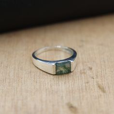 Moss Agate Signet Ring ~ 925 Solid Sterling Silver Signet Ring ~ Men's Signet Ring ~ Wedding Band Signet Ring ~ Handmade Ring ~ Unique Ring ❥ Metal: Solid sterling silver ❥ US Ring Size: Choose Size ❥ Stone Size: 6*8 mm Octagon Emerald Cut ✈ Free Shipping (USPS) ✈ Free Shipping to the United Kingdom 🎁 Free Gift Box ↻ 3 Days Return ⌛ 3-Day Handling Time General Care Instructions Remove jewellery when showering or bathing. This is particularly important when on the beach, in the sea and in chlori Signet Ring Men, Moss Agate Ring, Silver Signet Ring, Ring Wedding Band, Mens Silver Rings, Unique Ring, Ring Unique, Mens Wedding Rings, Ring Wedding