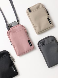 Editor's NotesPhone Crossbody  Bag is a lightweight cross bag that can carry phone and small belongings when traveling or just for daily use. There are pockets on the inside and outside for convenient storage of small items. It comes with a separate detachable cross strap.  - Waterproof fabric- Detachable shoulder strap- Zipper closure- 5 colors Measurements (in.)- 4.3 in. x 6.7 in. x 0.7 in. Composition & Care- Polyester, Nylon Designer- by TRAVE Mobile Bag, Crossbody Bag Pattern, Korean Accessories, Mobile Pouch, Money Pouch, Cell Phone Pouch, Lightweight Bag, Mini Tote Bag, Cross Bag