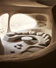 the interior of a cave like building with stone walls