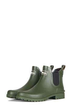 This durable lug-sole rain boot is topped with elastic gore insets for easy-on styling. Rubber and synthetic upper/textile lining/synthetic sole Imported Rain Boots With Rubber Sole For Fall Season, Green Weatherproof Rain Boots For Fall, Waterproof Slip-on Chelsea Boots For Outdoor, Fall Ankle Rain Boots With Rubber Sole, Green Rain Boots For Fall Outdoor Use, Green Rain Boots For Fall Outdoor Activities, Green Rain Boots For Outdoor Fall Activities, Green Fall Rain Boots For Outdoor, Rain Boots Women