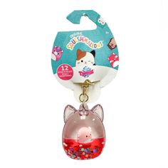 an animal shaped key chain with a pink pig inside