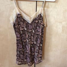 Gap Body Holiday 2004. New Without Tags. 100% Silk! You Don’t Find That Anymore At The Gap. Beautiful Lace. Adjustable Straps. Print Outer Layer And Solid Brown Underneath. Size Small. Solid Brown, Silk Camisole, The Gap, Women's Intimates, Gap, Adjustable Straps, Silk, Cream, Tags