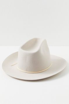 Top off your look in Western style with this felt cowboy hat. **Features:** Structured style, wool fabrication, dipped crown, upturned wide brim, suede band **Why We | Blaze Suede Tie Felt Cowboy Hat by Free People in White Cream Hat Bands With Curved Brim For Rodeo, Curved Brim Fur Felt Fedora For Ranch, White Felt Hat With Curved Brim For Ranch, Cream Brimmed Felt Hat For Country Events, White Fedora For Winter Rodeo, White Fedora For Rodeo In Winter, White Winter Fedora For Rodeo, Cream Wide Brim Felt Hat For Rodeo, Western Style Fur Felt Fedora For Spring