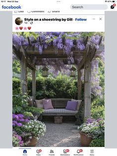 the facebook page has an image of a bench and wistery plants on it