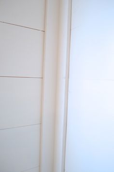 the corner of a room with white walls