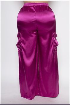 Our Radiant Rose Satin Cargo Pants offer a stunning sheen that catches the light with every move. The vibrant pink hue adds a bold pop of color to your wardrobe, making these pants a standout piece for any occasion. Key features: - Luxurious Satin Fabric: Soft to the touch and lightweight, ensuring all-day comfort.- Elegant Design: High-waisted with a relaxed fit, flattering every body type.- Functional Pockets: Stylish cargo pockets on each side, blending fashion with practicality.- Adjustable Saree Skirt, Satin Cargo Pants, Skirt Satin, Simple Blouse, Fitted Top, Plus Size Womens Clothing, Pink Outfit, Satin Fabric, Cargo Pants