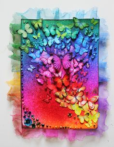 a multicolored painting with butterflies on it's back and bottom layer is shown