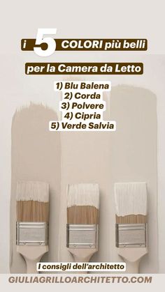 three paint brushes with different colors and sizes on the wall in front of each other