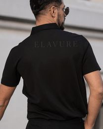 The Prestigio Polo Shirt – Elavure Elegant Black Polo Collar Top, Luxury Fitted T-shirt For Summer, Luxury Black Summer Tops, Luxury Polo Collar Tops For Summer, Elegant Collared Shirt With Graphic Print, Short Sleeve Graphic Print Tops, Elegant Short Sleeve Graphic Print Tops, Luxury Fitted Tops With Graphic Print, Elegant Collared Graphic Print Tops