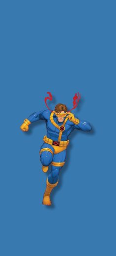 a man in blue and yellow is flying through the air with his arms out,