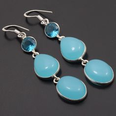 Chalcedony Blue Quartz Gemstone, Gift For Her, Earrings Jewelry, 925 Sterling Silver Plated, Multistone Earrings, Christmas Gift Materials Sterling Silver Plated Earrings Size - 2.8 x 0.3 Stone Name - Chalcedony Blue Quartz  Stone Color - Blue Shipping Policy We do ship through DHL, UPS, INDIA POST. The rest of the Earrings is made from 925 Sterling silver Plated 92.5% pure silver Plated . And it doesn't have any lead or nickel. I make more than 50 different gemstones. If you want other gemstones, Please inbox me. I'll show you the pictures before you buy. We will move forward only when you are satisfied. I can also make the Earrings in: Sterling Silver plated All kinds of customizations can be done. Try to keep it away from water. If it comes in contact of water then clean with a dry cott Sterling Silver Earrings With Stones For Gift, Sterling Silver Earrings With Stones As Gift, Sterling Silver Earrings With Stones, Blue Teardrop Sterling Silver Gemstones, Blue Multi-stone Earrings For Jewelry Making, Chalcedony Drop Earrings With Natural Stones, Unique Blue Chalcedony Jewelry, Blue Multi-stone Sterling Silver Earrings, Nickel-free Blue Teardrop Crystal Earrings