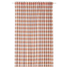 an orange and white checkered curtain