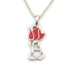 a necklace with a red rose on the front and an intertwined heart in the middle