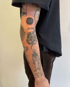 a man with a tattoo on his arm