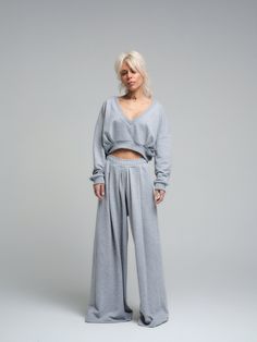 "Our casual two-piece set in grey is a comfortable and stylish choice. The crop top features a V-neck paired with high-waisted pants, crafted from a cozy cotton-polyester blend. Ideal for a relaxed day or a quick outing. FEATURES: The relaxed fit drapes comfortably over the body, promoting freedom of movement and a laid-back aesthetic. 100% Handmade. SIZE & FIT: Fit: A relaxed fit with room to move The model is wearing size Small or S/M View our SIZE CHART before ordering MATERIALS & CARE: Conte Womens Sports, Two Piece Set, Grey Cotton, Two Piece Sets, High Waisted Pants, Sports Women, Bulgaria, Crop Top, Two Piece