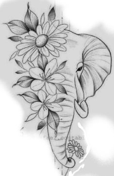 an elephant with flowers on it's back and its trunk in the shape of a heart