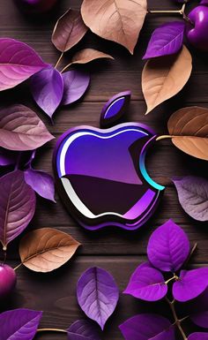 an apple logo surrounded by leaves and purple berries on a wooden surface with the words,