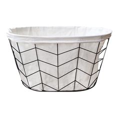 a white basket with black lines on it