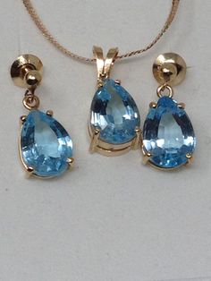 "Vintage Estate 14Kt Topaz Pendant , Chain and Earring Set. Chain is approx 17 3/4 inches long. PROFESSIONAL INSURANCE APPRAISAL of $1600.00 This set has been professionally appraised and that written appraisal will accompany the set when sold. Since I am not an expert regarding this item, I have relied on the expertise of the certified professional appraisal. The following details about this pendant, chain and earrings are from a Certified Gemmologist-Certified Gold Smith appraisal: \" A 14 kar Formal Yellow Gold Gemstone Jewelry Sets, Formal Yellow Gold Jewelry Sets With Gemstones, Drop-shaped Topaz Jewelry For Anniversary, Drop Shape Topaz Jewelry For Anniversary, Drop Shaped Topaz Jewelry For Anniversary, Drop Topaz Jewelry For Anniversary, Teardrop Topaz Yellow Gold Jewelry, Teardrop Blue Topaz Jewelry In Yellow Gold, Yellow Gold Topaz Teardrop Jewelry