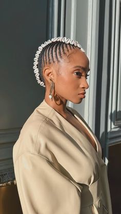 Aminata Kamara || Hair stylist on Instagram: "Braids are so regal 👸🏽😍

Couldn’t be more in love with this creation! 
Thank you @marie_mag_ for having me bring your vision to life. 

Check out her page for the full breakdown on how we went from the initial idea to the final execution. ✨

#braids #fashionweek #PFW #afrohair #afrohairstyle #conrowstyles #cornrowbraids #fashionweek #sessionhair #aminatacreative" Plaits