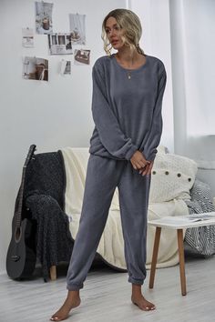 Keep your loungewear casual-cool with this sweatshirt and joggers set featuring a comfortable stretch-infused fit. Includes sweatshirt and matching joggers (two pieces total) Size Guide: Talita s 5’6” tall, and has a 33” bust, 24” waist, & 35” hips. She is wearing a S / US 4 / AU 8. This loungewear set is true to size. Sweatshirt (size S): 29" long from high point of shoulder to hem Joggers (size S): 27" inseam Material: 100% polyester Care Instructions: Machine wash / Cold hand wash Home Outfits Men, Cozy At Home Outfits, At Home Outfits, Cozy At Home, Joggers Set, Blue Crewneck, Grey Crewneck, Loungewear Sets, Loungewear Set