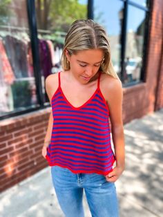 Step up your game day attire with our Striped Flare Cami in Cherry! Made for KU game days with its bold and vibrant stripes. Show off your team spirit in style with this must-have piece that will elevate any outfit. Get ready to cheer loud and proud! GO JAYHAWKS!!! Red Summer Tops For Sports Events, Red Tops For Summer Sports Events, Red Tops For Sports Events In Summer, Summer Sports Tops With Contrast Stripes, Summer Sports Top With Contrast Stripes, Sporty Striped V-neck Top, Summer V-neck Top With Contrast Stripes, Trendy Tops For Game Day In Summer, Spring Striped Sports Tops