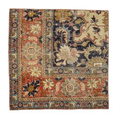 an antique rug with various colors and designs