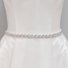 Bridal Rhinestones Belts, Bridal Belt Rhinestone, Rhinestone Bridal Belt, Wedding Belts for Brides This slender crystal-adorned Bridal Rhinestones Belts will add a subtly beautiful shine to your wedding dress. 💖 Details - Embellishment measures 17 inches long and .7 inches wide - Finished with soft ivory organza, measures 108 inches long - Handmade with sparkling crystals 💖 Packaging Each accessory is delicately packaged in our exclusive soft and luxe velvet bag, ensuring its pristine condition until your special day. 💖 Shipping This item is currently in stock, and will be shipped within 2 business days from NY 💖 Returns & Exchanges At bridal accessories shop, we understand that planning your dream wedding can be a whirlwind, your desire to look like the most beautiful bride in the wor Rhinestone Bridal Belt, Pearl Wedding Dress Belt, Crystals Packaging, Bride Belt, Wedding Dress Details, Pearl Belt, Wedding Jewelery, Pearl Wedding Dress, Nye Wedding