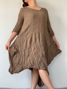 "COTTON GAUZE Long Sleeves Dress, Double Gauze cotton Dress easy to wear, Pullover style Measurements approximately: Shoulder: 18\" Armhole: 20\" Bust: 44\" - 46\" Hips: 48\" Length 36\" Material- DOUBLE GAUZE COTTON ❤️ PAYMENT We accept payments via PayPal only. ❤️❤️ Shipping: via DHL Express. - All items will be shipped within 1 business day after received payment. ❤️❤️ Delivery Time : USA only 3 business days Canada: 3 business days France: 3 business days Germany 3 business days North Americ Oversized Cotton Knee-length Midi Dress, Brown Cotton Midi Dress For Daywear, Oversized Knee-length Cotton Dress, Cotton V-neck Lagenlook Dress, Cotton Lagenlook Dress With Relaxed Fit, Cotton Lagenlook Relaxed Fit Dress, Brown Cotton Lagenlook Dress, Oversized Cotton V-neck Tunic, Brown Relaxed Fit Cotton Dress